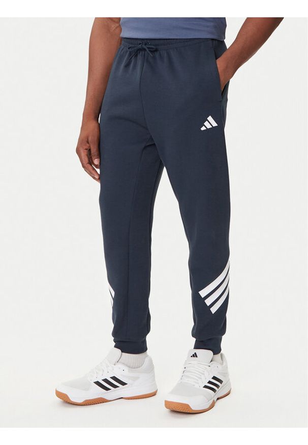 Adidas - adidas Spodnie dresowe Future Icons 3-Stripes JW7088 Granatowy Regular Fit. Kolor: niebieski. Materiał: syntetyk, bawełna