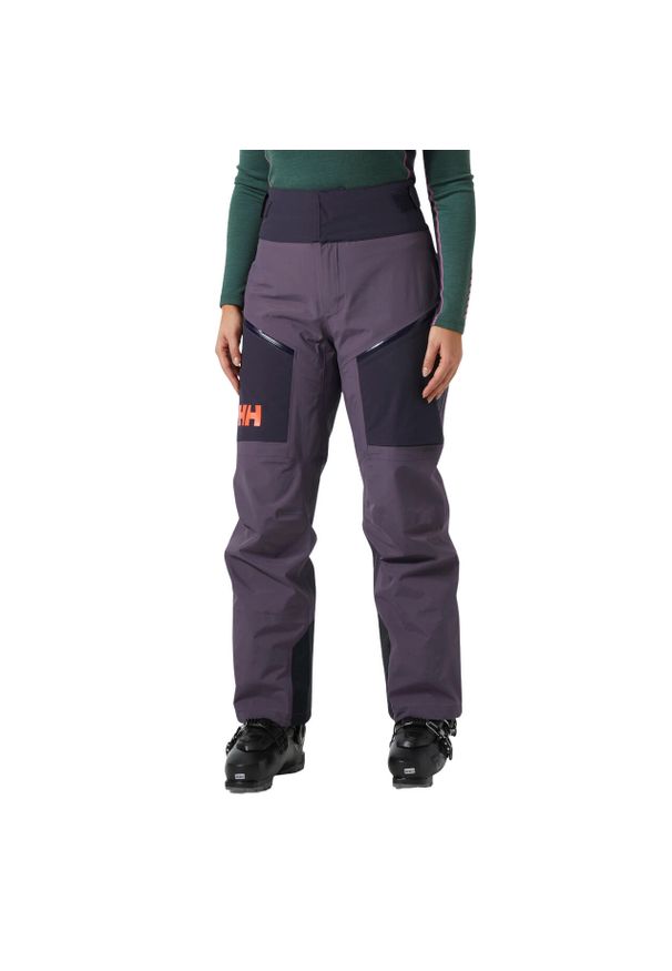 Spodnie narciarskie dla kobiet Helly Hansen Sogn Shell. Stan: podwyższony. Kolor: fioletowy. Sezon: zima. Sport: narciarstwo