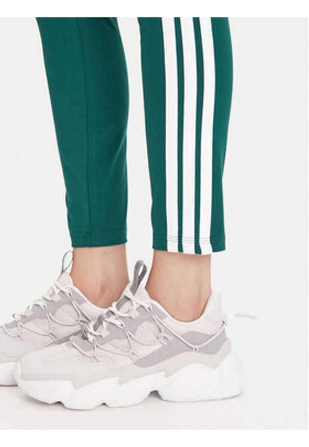Adidas - adidas Legginsy Essentials 3-Stripes KB7663 Zielony Slim Fit. Kolor: zielony. Materiał: bawełna