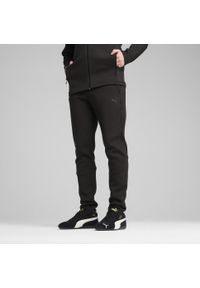 Puma - Męskie spodnie Evostripe Core PUMA Black. Kolor: czarny. Materiał: dresówka. Sport: piłka nożna