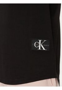 Calvin Klein Jeans Tank top Monologo Badge J30J325529 Czarny Regular Fit. Kolor: czarny. Materiał: bawełna