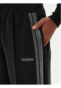 Guess Spodnie dresowe V6RB01 KCAY2 Czarny Regular Fit. Kolor: czarny. Materiał: syntetyk #4