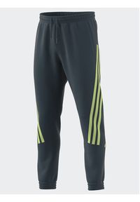 Adidas - adidas Spodnie dresowe Future Icons 3-Stripes Joggers IJ6372 Turkusowy Slim Fit. Kolor: turkusowy. Materiał: bawełna, dresówka