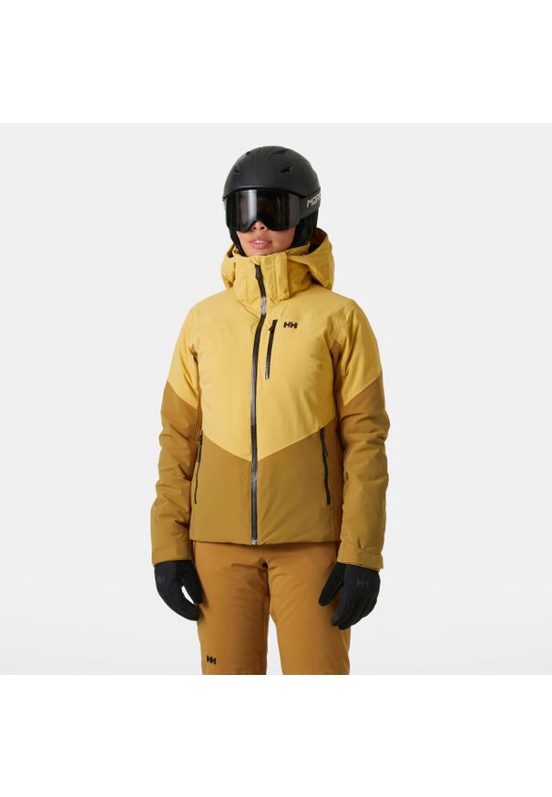Damska kurtka narciarska Helly Hansen Alphelia. Kolor: żółty, beżowy, wielokolorowy. Sezon: zima. Sport: narciarstwo