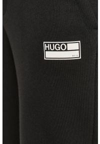 Hugo - Spodnie. Kolor: czarny. Materiał: bawełna, poliester, materiał, dzianina. Wzór: nadruk #3