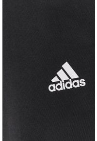 Adidas - adidas Spodnie męskie kolor czarny z nadrukiem. Kolor: czarny. Materiał: poliester, bawełna. Wzór: nadruk