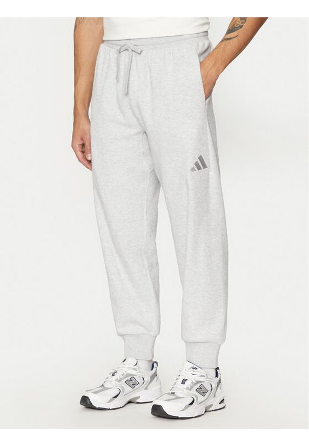 Adidas - adidas Spodnie dresowe Elevated ALL SZN Terry Loop IY6582 Szary Loose Fit. Kolor: szary. Materiał: bawełna