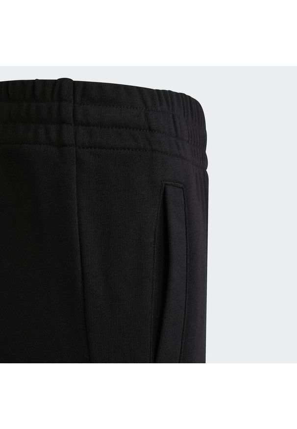 Spodnie dresowe dla dzieci Adidas Brandlove Czarny. Kolor: czarny, biały, wielokolorowy. Materiał: dresówka. Sport: joga i pilates