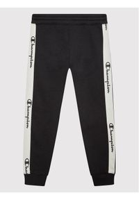 Champion Spodnie dresowe 404471 Czarny Regular Fit. Kolor: czarny. Materiał: syntetyk #1