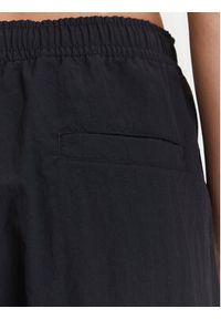 Nike Spodnie dresowe Trend FQ3588 Czarny Relaxed Fit. Kolor: czarny. Materiał: syntetyk #3