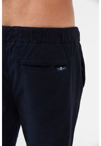 7 FOR ALL MANKIND Granatowe spodnie męskie Jogger Chino, Rozmiar L. Kolor: niebieski. Materiał: bawełna #4