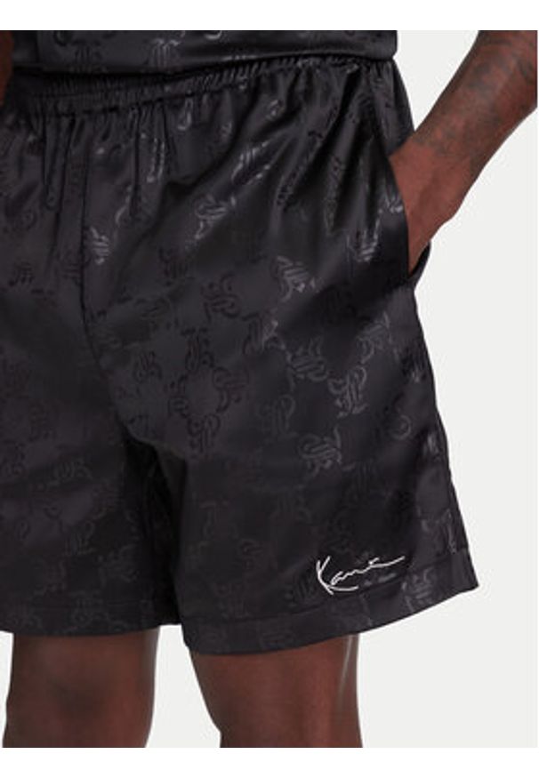 Karl Kani Szorty sportowe Signature All Over Print Resort PD00005302 Czarny Regular Fit. Kolor: czarny. Materiał: syntetyk. Wzór: nadruk. Styl: sportowy