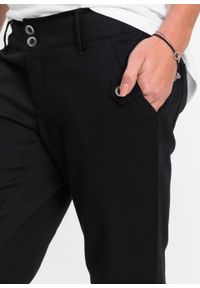 Spodnie biznesowe BOOTCUT w tenisowe prążki bonprix czarny w paski. Okazja: na spotkanie biznesowe. Kolor: czarny. Wzór: paski, prążki. Styl: biznesowy #7
