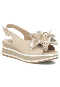 Skórzane sandały damskie na koturnie beżowe Filippo DS7045/26. Kolor: beżowy. Materiał: skóra. Sezon: lato. Obcas: na koturnie #1