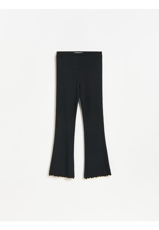 Reserved - Legginsy flare - czarny. Kolor: czarny. Materiał: bawełna, dzianina
