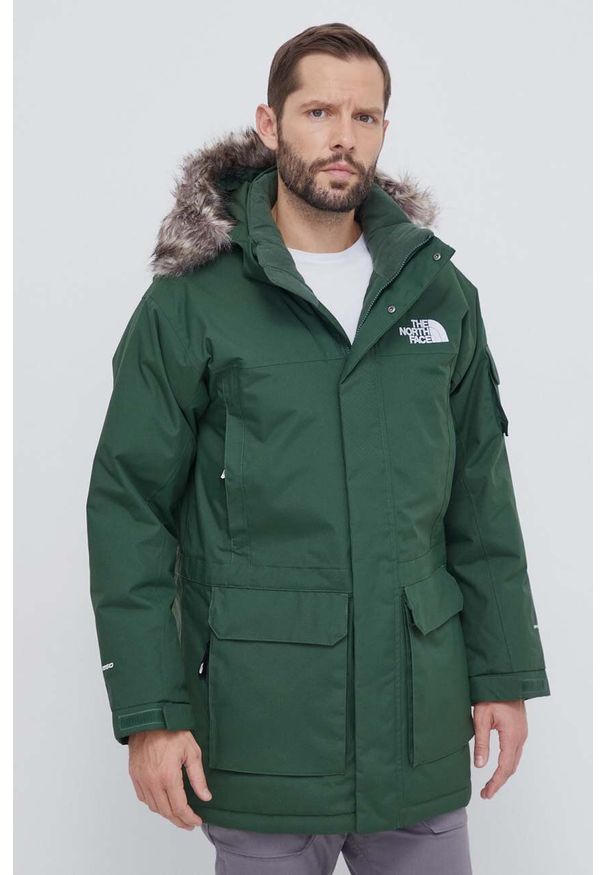The North Face kurtka puchowa męska kolor zielony zimowa. Kolor: zielony. Materiał: puch. Sezon: zima