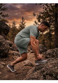 Sinsay - Szorty sportowe SNSY PERFORMANCE - zielony. Kolor: zielony. Styl: sportowy