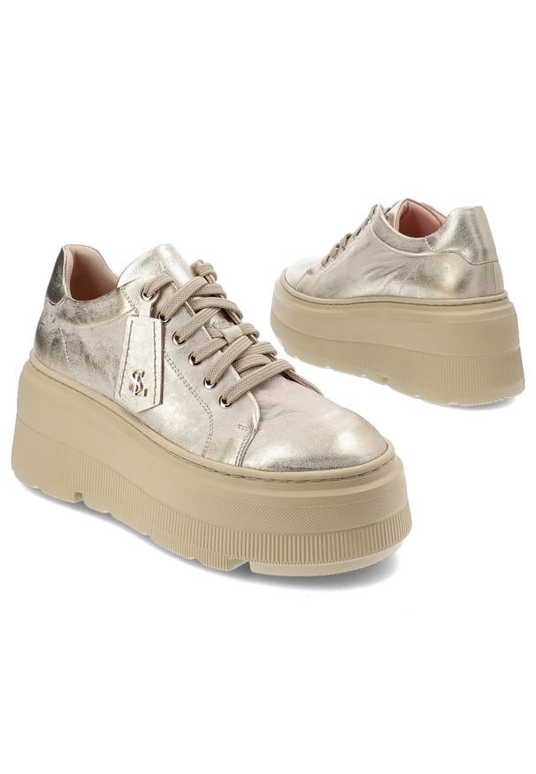 Złote Sneakersy Libero Modne Obuwie Damskie. Okazja: na spacer, na co dzień. Zapięcie: sznurówki. Kolor: złoty. Materiał: skóra, jeans, guma. Styl: elegancki, casual