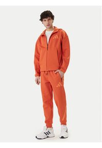 Adidas - adidas Spodnie dresowe Z.N.E. KE4686 Pomarańczowy Regular Fit. Kolor: pomarańczowy. Materiał: bawełna #3