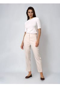 Sinsay - Spodnie cygaretki - kremowy. Kolor: kremowy