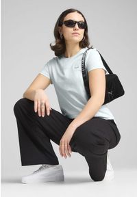 Puma - Damska koszulka ESS ELEVATED PUMA Peaceful Blue. Kolor: niebieski. Wzór: aplikacja, haft. Sport: fitness