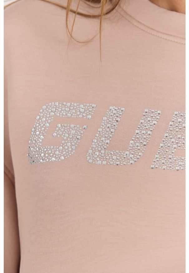 Guess - GUESS Beżowa damska bluza z cyrkoniami Cecilia, Rozmiar L. Kolor: czarny. Materiał: wiskoza, poliamid, elastan, materiał. Długość rękawa: długi rękaw. Długość: długie. Styl: elegancki