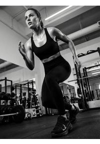 Sinsay - Legginsy sportowe - czarny. Kolor: czarny. Styl: sportowy #1