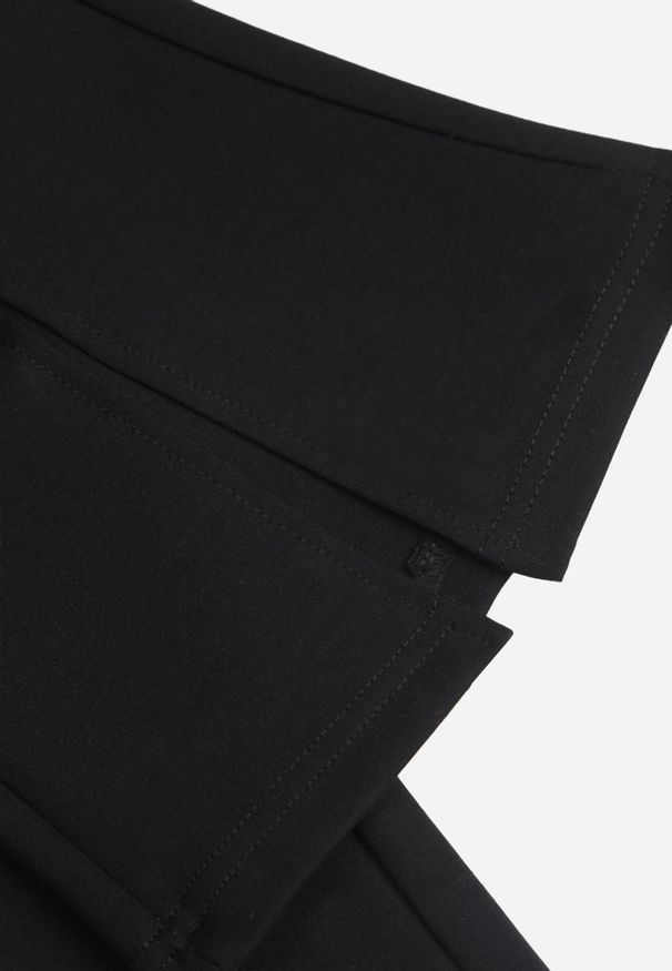 Born2be - Czarne Spodnie o Kroju Dzwonów z Ozdobnymi Rozcięciami Telocus. Okazja: na co dzień. Kolor: czarny. Materiał: wiskoza, bawełna. Styl: elegancki, casual