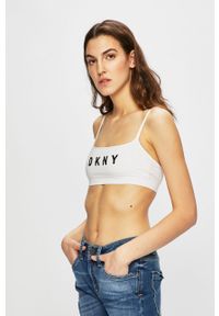 DKNY - Dkny - Biustonosz sportowy. Kolor: biały. Materiał: nylon, materiał, lyocell, elastan. Wzór: gładki, nadruk #1