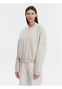 Adidas - adidas Bluza Essentials Contemporary Logo JD9972 Beżowy Loose Fit. Kolor: beżowy. Materiał: syntetyk, bawełna #1