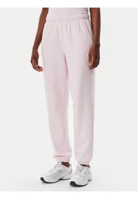 New Balance Spodnie dresowe Essentials WP41500 Różowy Relaxed Fit. Kolor: różowy. Materiał: bawełna, syntetyk #1