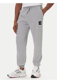 The North Face Spodnie dresowe Fine NF0A8C1K Szary Tapered Fit. Kolor: szary. Materiał: bawełna