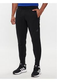 Adidas - adidas Spodnie dresowe Z.N.E. Winterized IN1899 Czarny Regular Fit. Kolor: czarny. Materiał: syntetyk