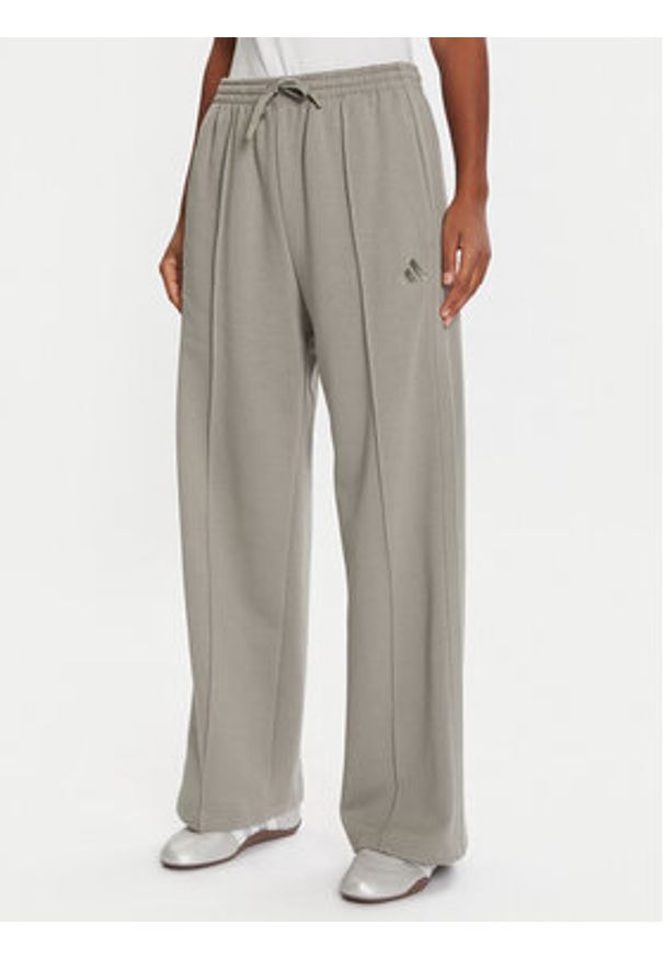 Adidas - adidas Dres Energize JX0535 Zielony Regular Fit. Kolor: zielony. Materiał: bawełna, syntetyk