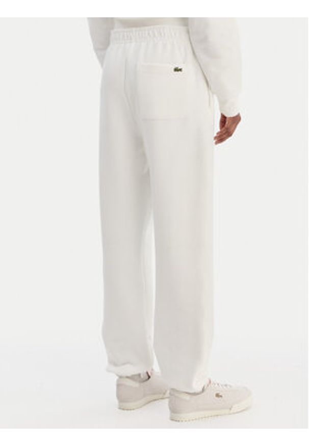 Lacoste Spodnie dresowe XF5244 Écru Regular Fit. Kolor: kremowy. Materiał: bawełna