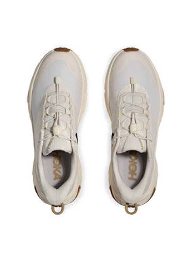 HOKA - Hoka Sneakersy Transport 2 1171850 Beżowy. Kolor: beżowy. Materiał: materiał