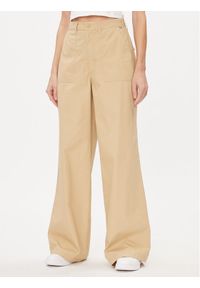 Tommy Jeans Spodnie materiałowe Claire DW0DW17314 Beżowy Wide Leg. Kolor: beżowy. Materiał: bawełna
