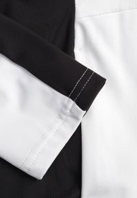 Born2be - Biała Pikowana Kurtka Przejściowa z Kapturem i Elastycznymi Rękawami Nikitha. Okazja: na co dzień. Typ kołnierza: kaptur. Kolor: biały. Materiał: jeans, nylon. Styl: casual, elegancki, sportowy, klasyczny #3