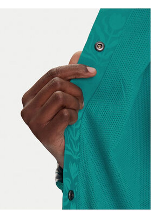 Adidas - adidas Kurtka przejściowa Tiro x Common Goal Coaches JL9204 Turkusowy Loose Fit. Kolor: turkusowy. Materiał: syntetyk