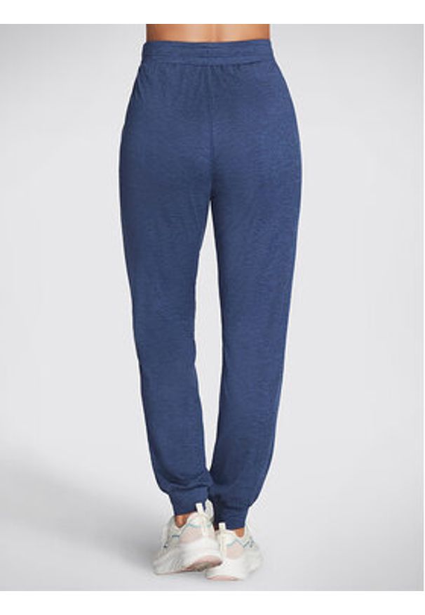 skechers - Skechers Spodnie dresowe Godri Swift Jogger WPT254 Niebieski Regular Fit. Kolor: niebieski. Materiał: syntetyk