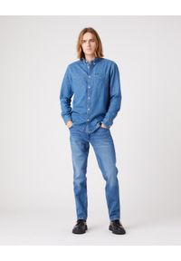 Wrangler - Spodnie jeansowe męskie WRANGLER GREENSBORO NEW FAVORITE. Okazja: do pracy, na spacer, na co dzień. Kolor: niebieski. Materiał: jeans. Styl: casual #5