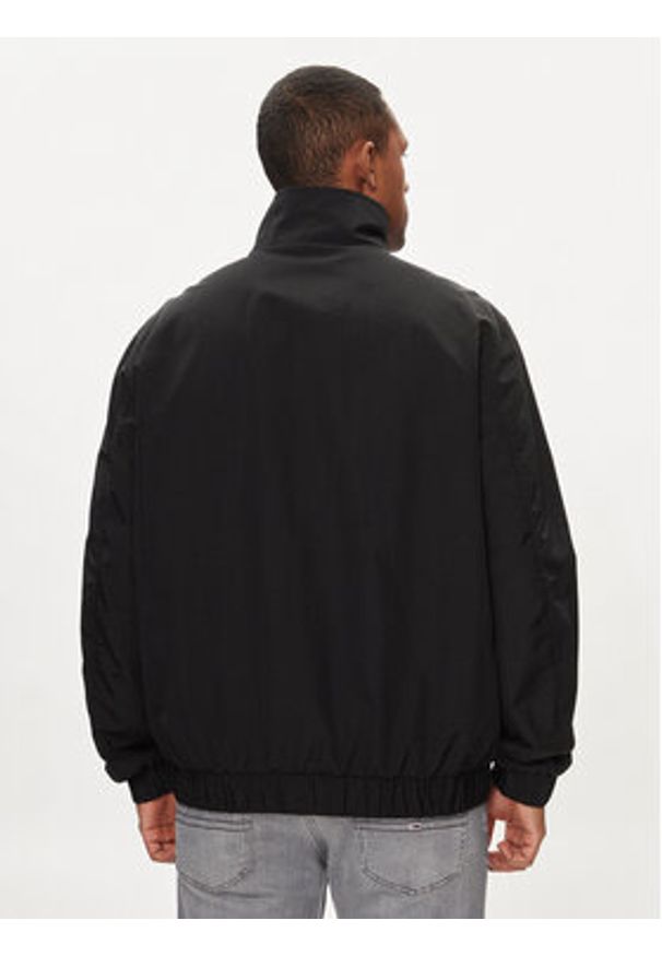 Tommy Jeans Kurtka bomber Essential DM0DM17982 Czarny Regular Fit. Kolor: czarny. Materiał: syntetyk