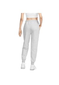 Nike - Damskie Sportowe Spodnie Do Biegania Z Polaru. Kolor: szary. Materiał: polar. Sport: turystyka piesza