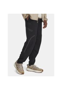 Spodnie męskie Under Armour Unstoppable Cargo. Kolor: czarny. Sport: fitness #1