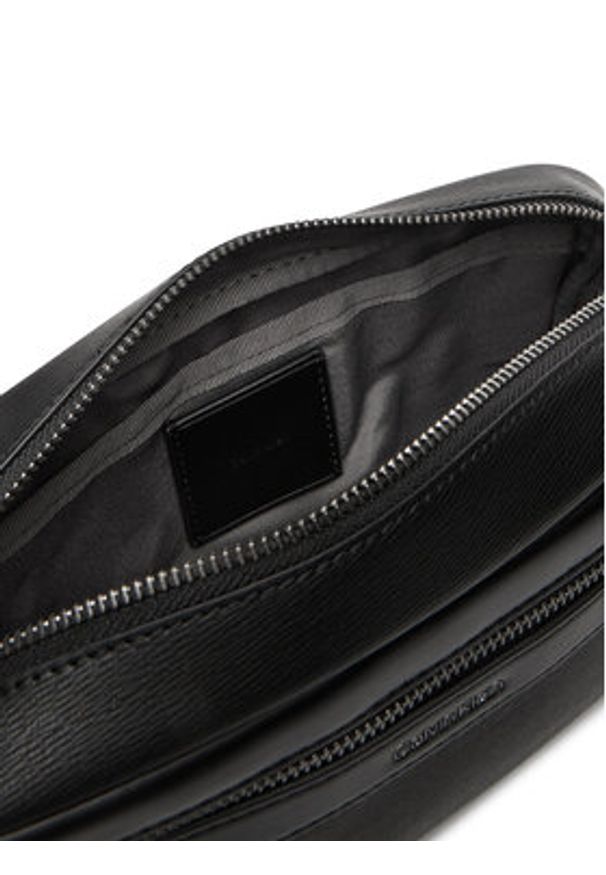 Calvin Klein Saszetka Zip Camera Bag LV04D3262G Czarny. Kolor: czarny. Materiał: skóra