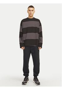 Jack & Jones - Jack&Jones Spodnie dresowe Gordon 12258477 Czarny Regular Fit. Kolor: czarny. Materiał: syntetyk