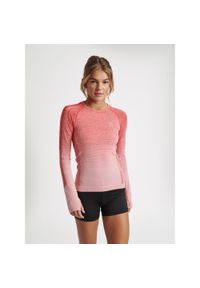 Damski jersey Hummel GG - 12. Kolor: czerwony, pomarańczowy, wielokolorowy. Materiał: jersey. Wzór: nadruk