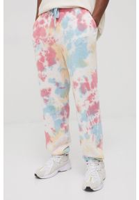 Tommy Jeans spodnie bawełniane męskie wzorzyste. Materiał: bawełna. Wzór: nadruk #1