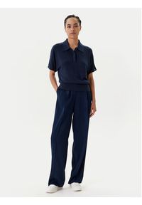 TOMMY HILFIGER - Tommy Hilfiger Spodnie materiałowe WW0WW46749 Granatowy Relaxed Fit. Kolor: niebieski. Materiał: wiskoza #4