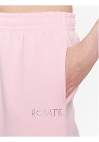 ROTATE Spodnie dresowe Crystal 700157043 Różowy Relaxed Fit. Kolor: różowy. Materiał: bawełna